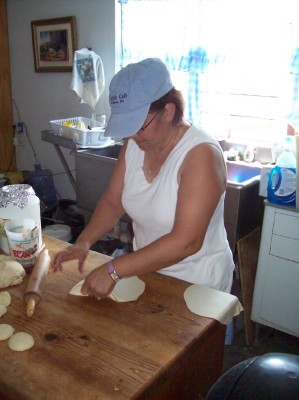 Caroline rolling tortillas