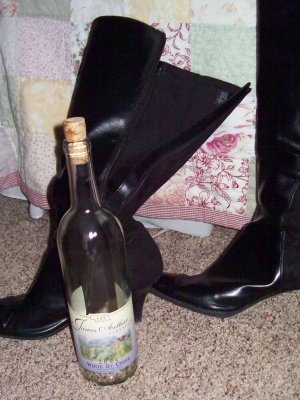 Fabulous knee high boots with wine bottles