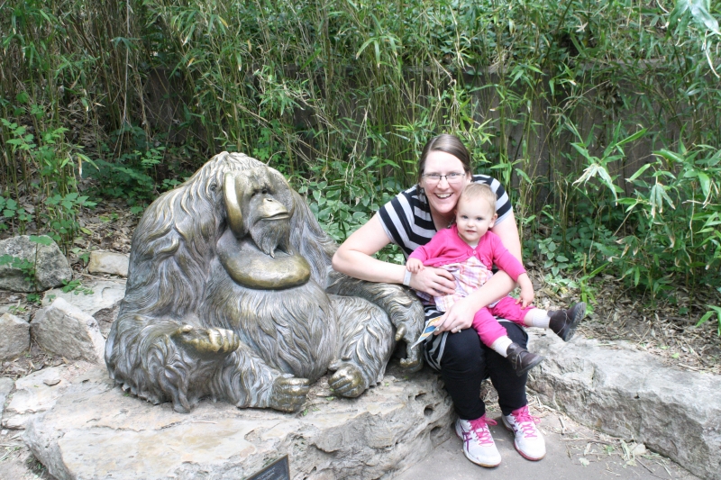 Tirzah Mae and Mama with an Orangutan statue