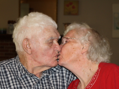 Grandma and Grandpa kissing